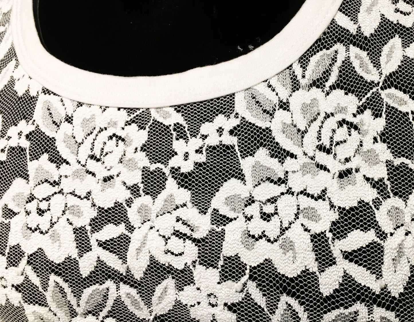 White floral lace tee with black base and clean white rounded neckline perfect for casual wear