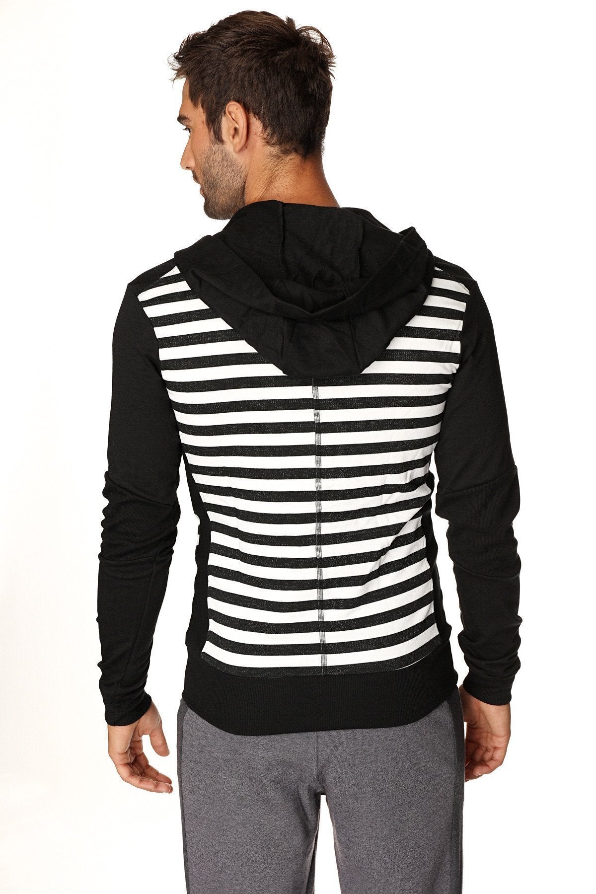 Limited edition black and white striped form-fit crossover yoga track fleece hoodie with solid black hood sleeves and hem