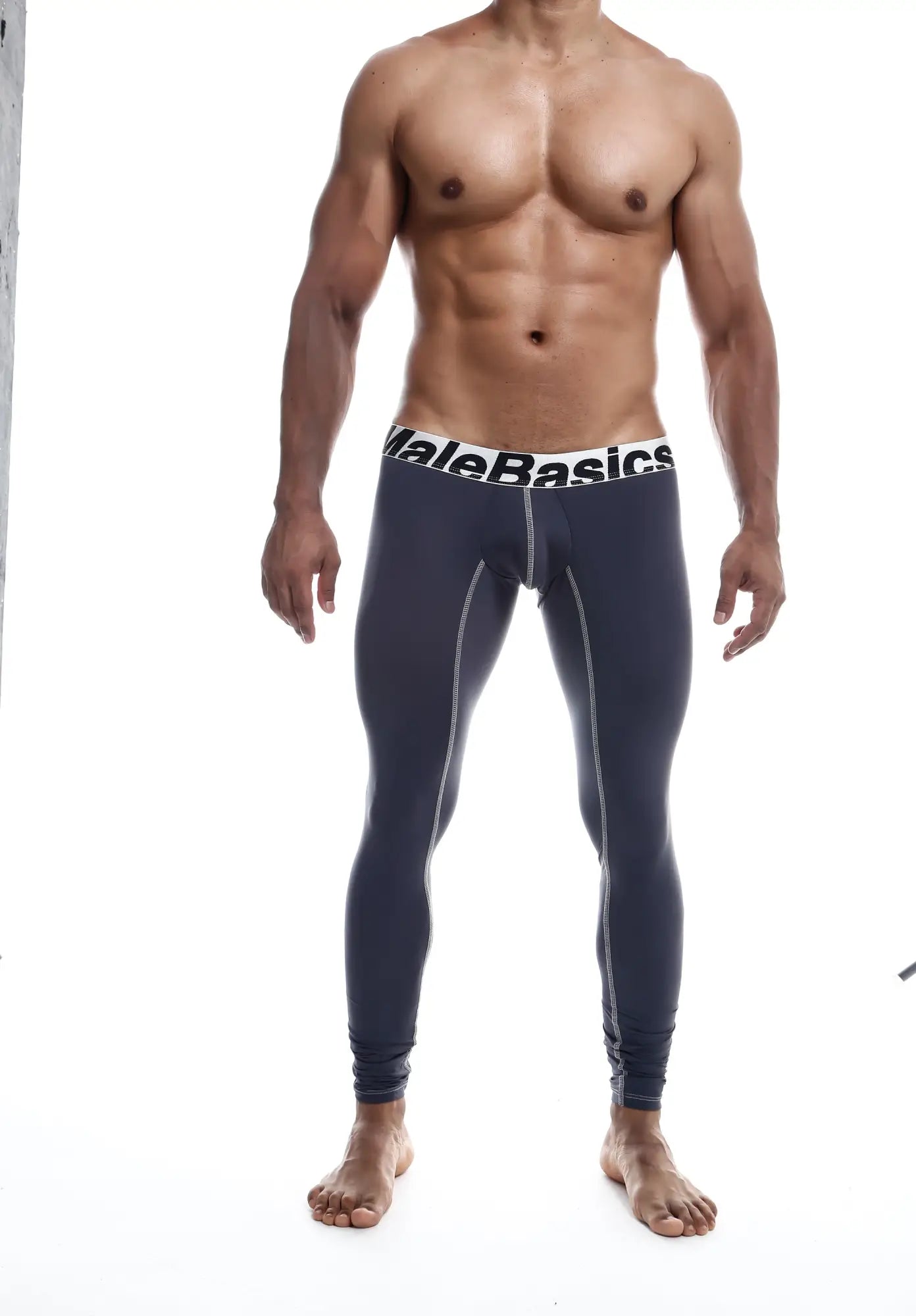 Dark navy blue malebasics microfiber compression tights with white elastic waistband and gray seam stitching