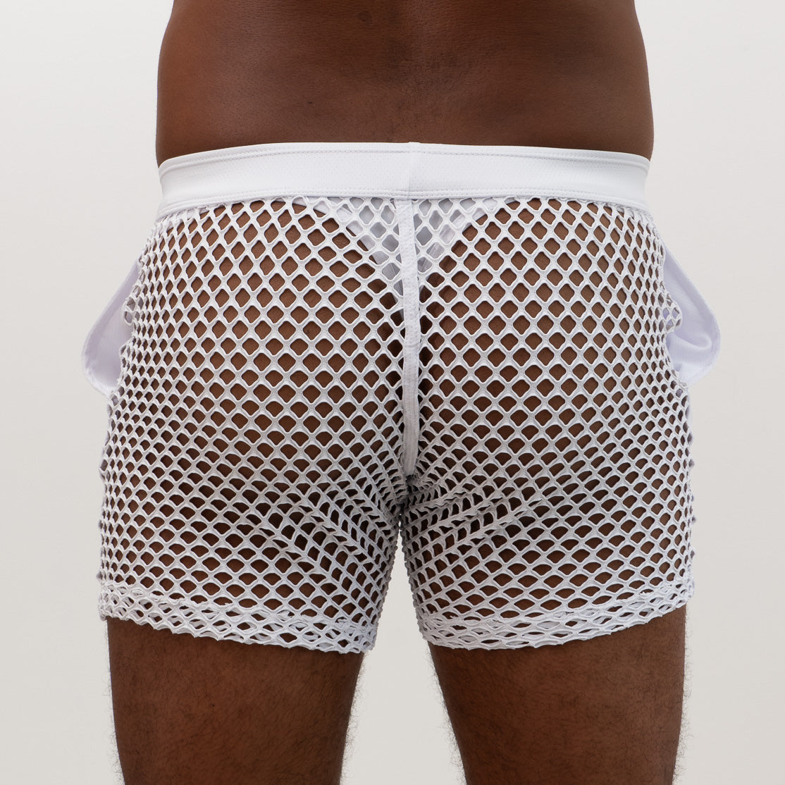 White mesh boxer shorts with solid white waistband and side pockets featured in mesh back short product line