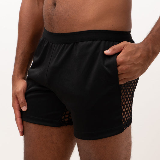 Black athletic mesh back short with solid fabric waistband and breathable mesh side paneling for active use