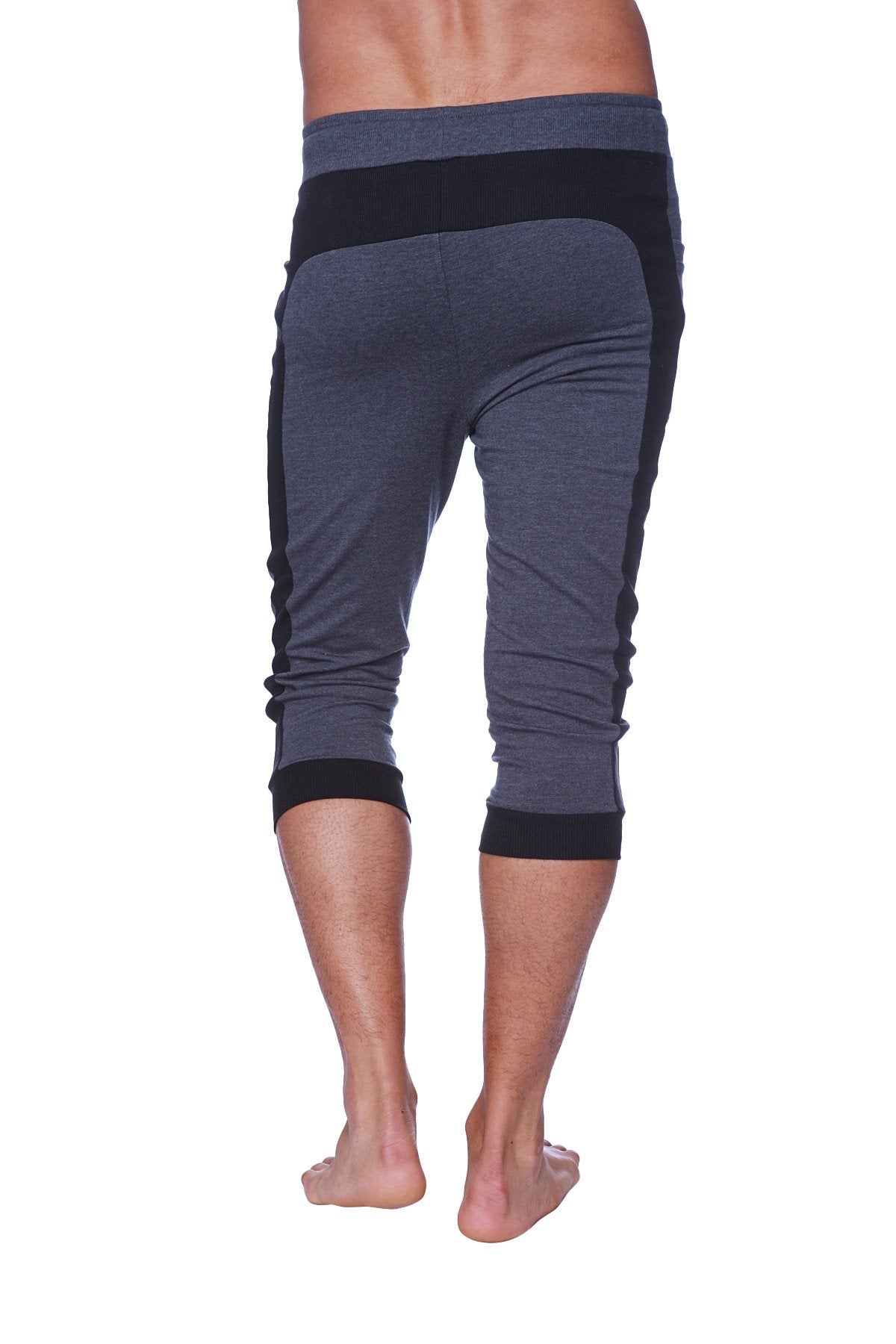 Mens cuffed yoga pants in dark gray and black with ribbed waistband and cuffs for athletic wear