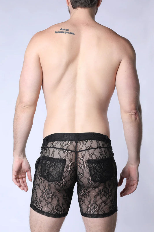 Positano lace shorts featuring black lace with intricate floral patterns and solid black fabric accents on waistband and pockets