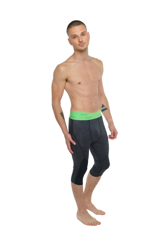 Performance yoga leggings 3/4 length in charcoal heather with black compression fabric and bright green waistband