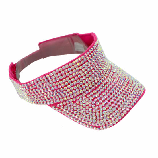 A vibrant pink rhinestone visor with a dense sparkling array of clear and iridescent rhinestones in five colors