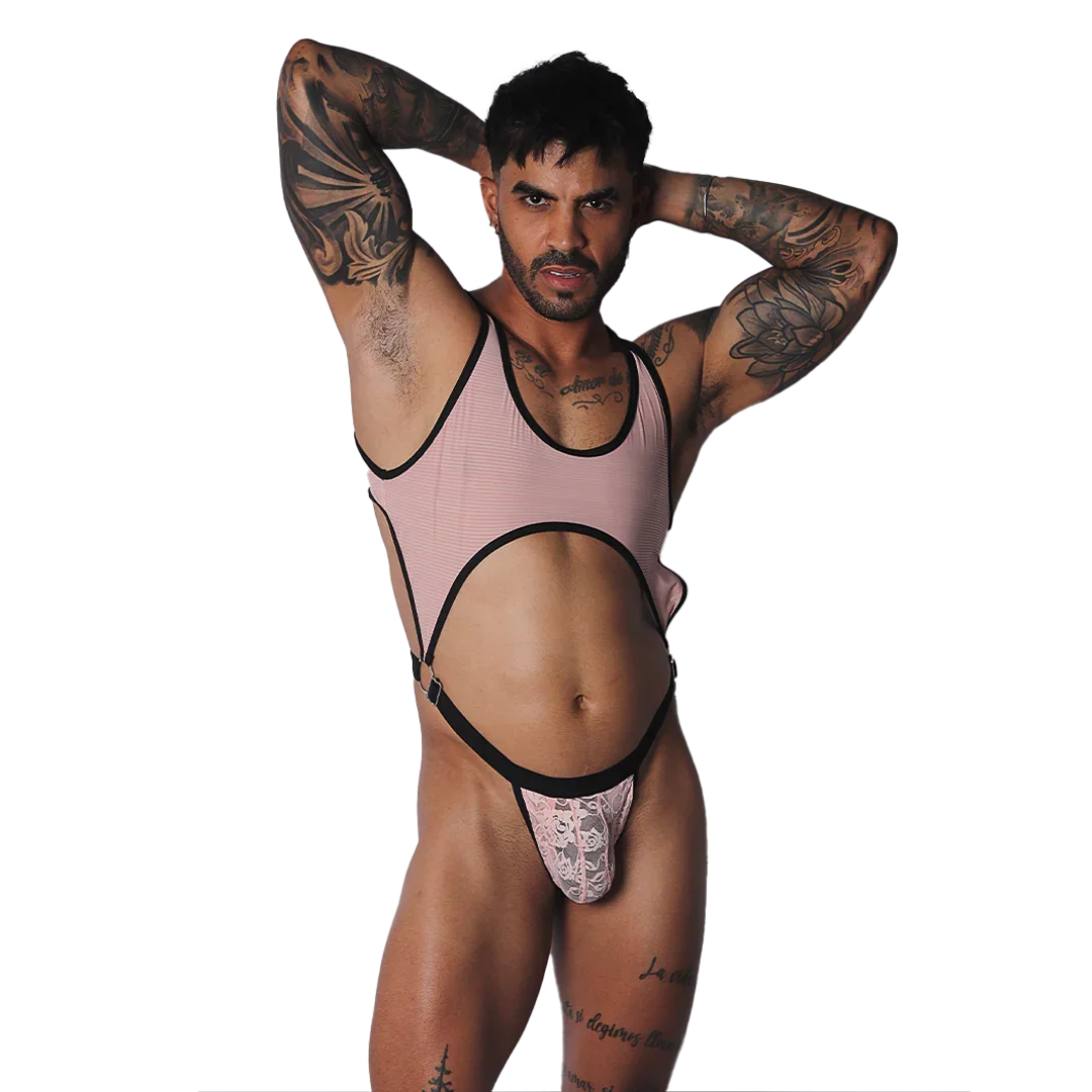 Pink ribbed bodysuit with black trim, large midriff cutout, O-ring connectors, and a lace pouch detail.