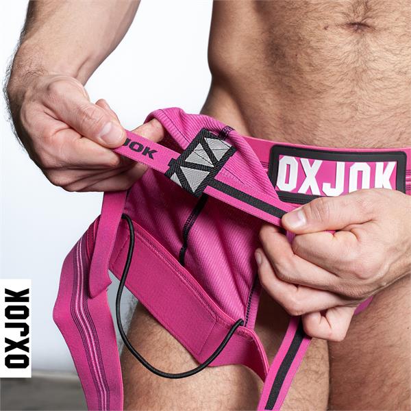 Slingjock jockstrap briefs in bright pink with black trim and geometric waistband from Oxjok