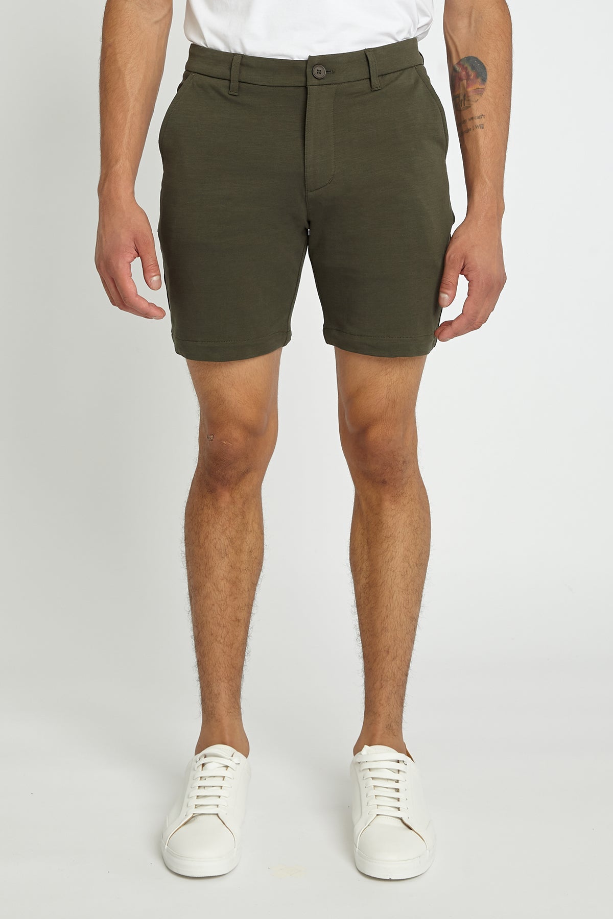 Olive green solid stretch knit chino shorts with classic fit and button closure