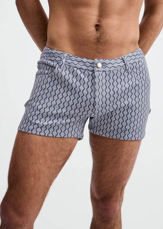 Blue embossed jacquard shorts with a wavy pattern, belt loops, and a front button closure.