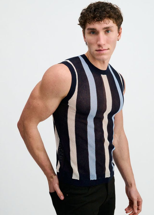A person wearing a navy, beige, and light blue striped open knit tank top.