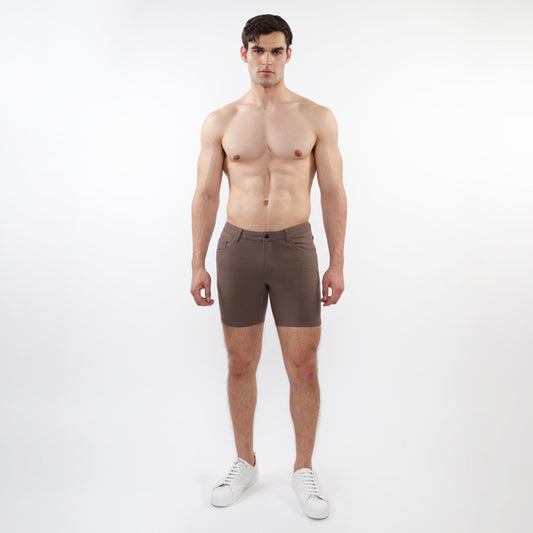 A pair of slim-fit dark brown stretch knit shorts with a modern design and subtle stitching details