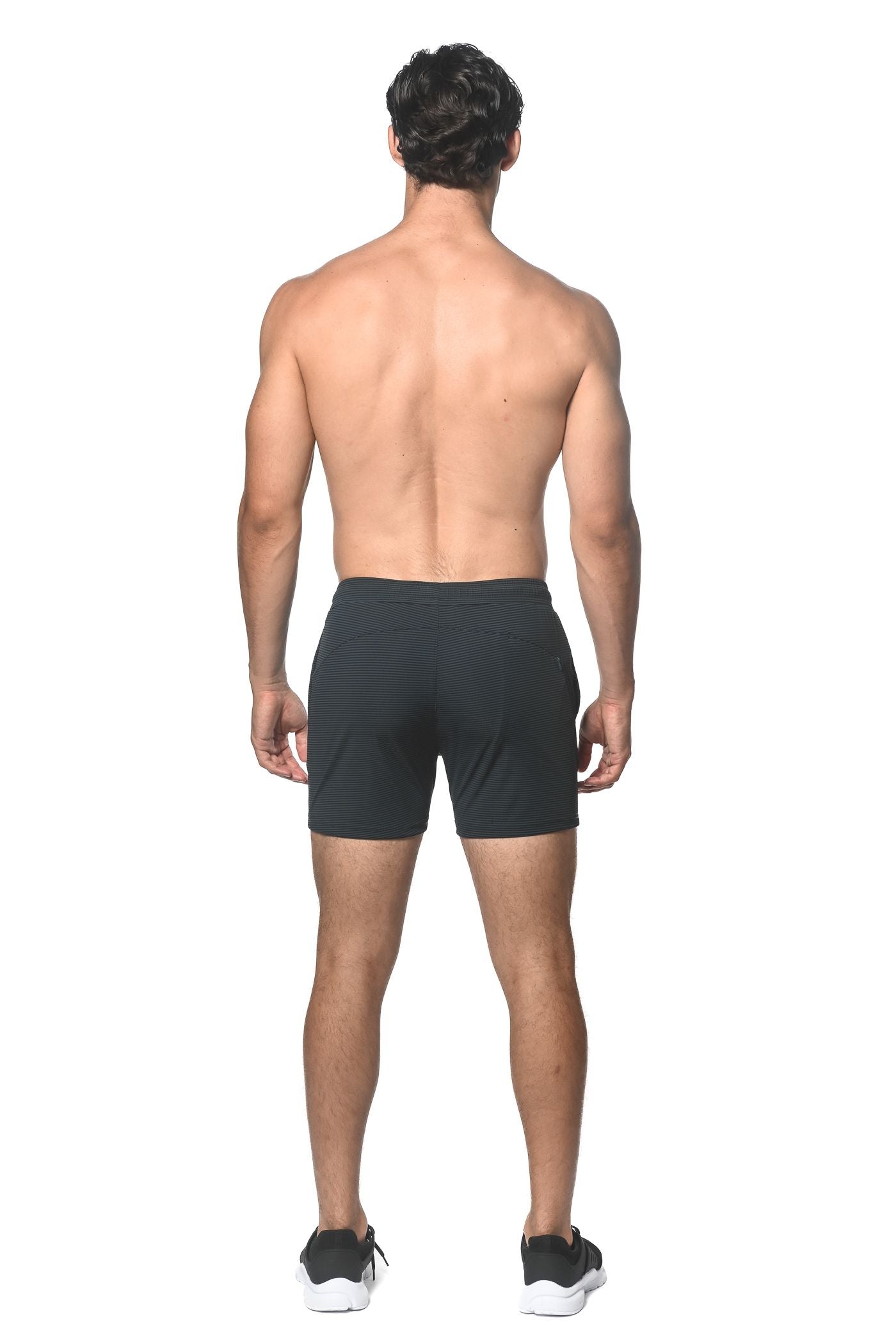 Black stripe stretch performance shorts with subtle textured pattern designed for athletic use