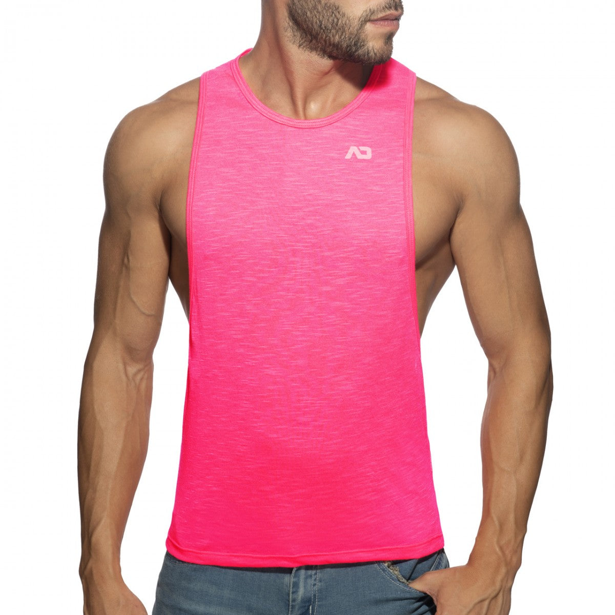 Bright pink thin flame low rider athletic tank top with subtle heathered texture and small white chest logo