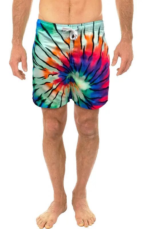 Tie dye swim short featuring vibrant swirling red orange blue and green hues perfect for beachwear