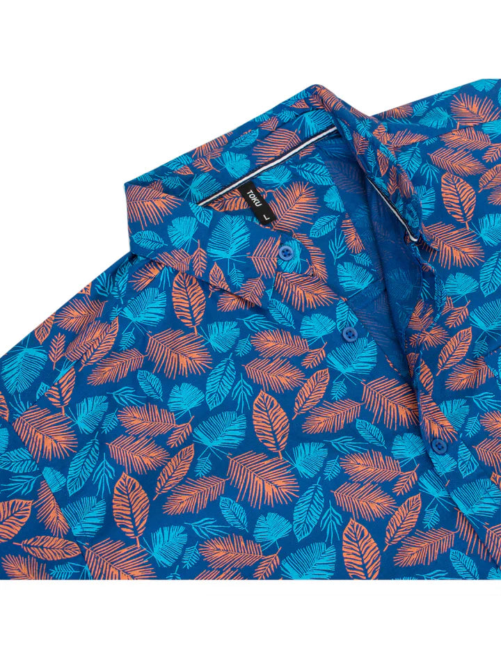 Toku palm print shirt featuring vibrant blue and orange tropical leaf pattern in button-down style