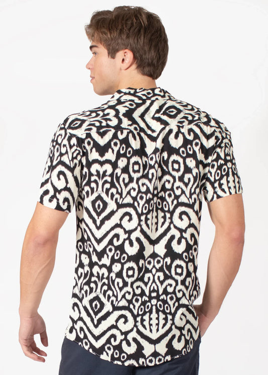 Black and white short-sleeved button-up tribal abstract s s shirt with intricate ikat pattern for casual wear