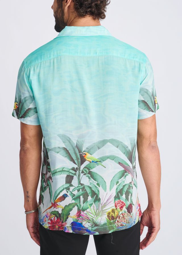A vibrant mint green tropics border print short-sleeved modal shirt with colorful birds and lush foliage