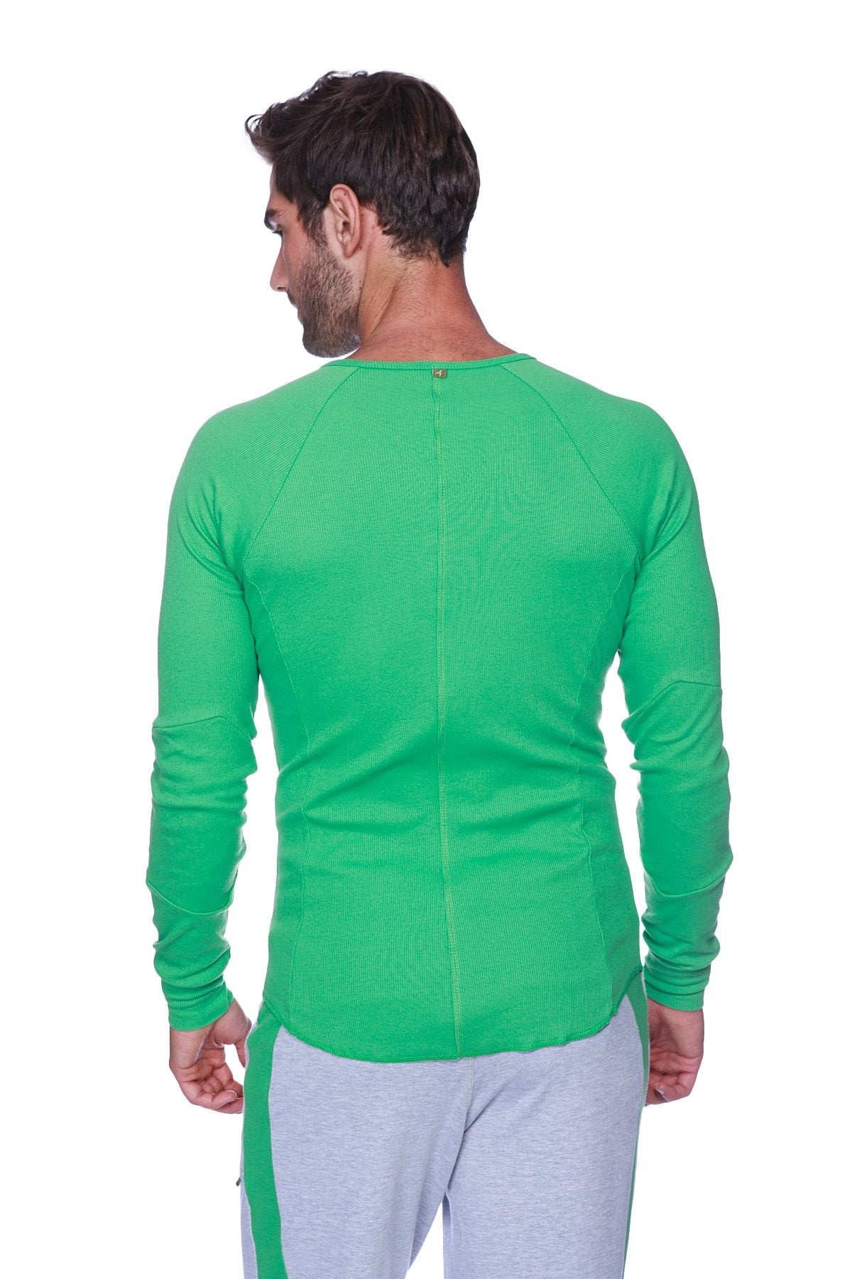 Bright green thermal v neck long sleeve shirt made of bamboo with ribbed texture and raglan sleeves for athletic use