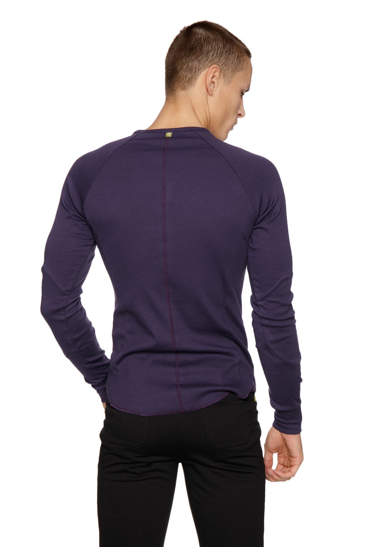 A sleek deep purple thermal v-neck long sleeve shirt with fitted cut and subtle seam detailing for athletic use