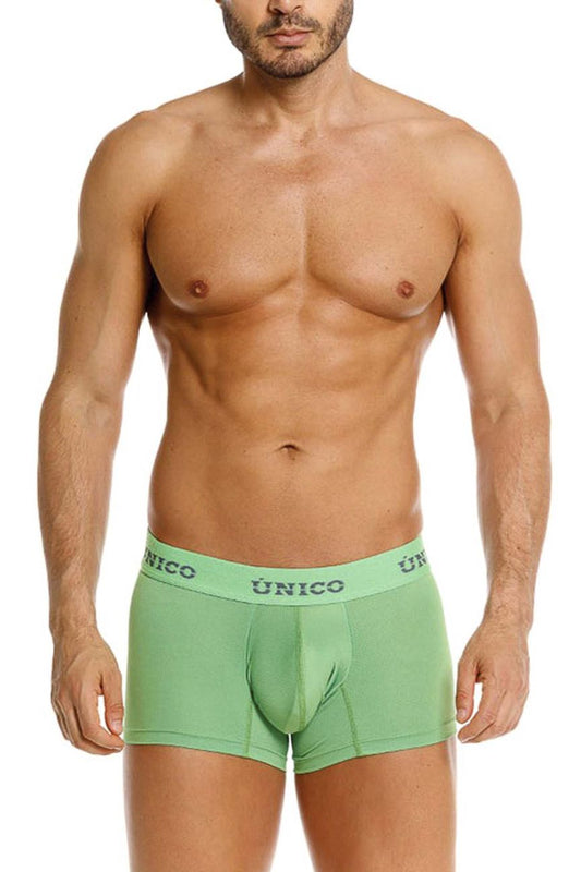 Light green unico frog trunks briefs with subtle elastic waistband and dark gray brand name lettering