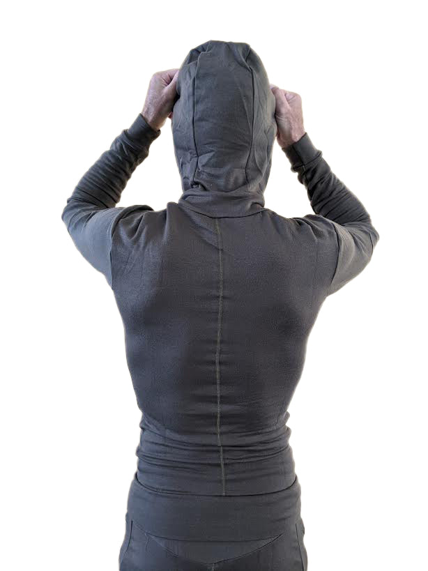 Dark gray hooded long-sleeve top with fitted form-fit design and visible seam detailing from winter collection luxury fleece