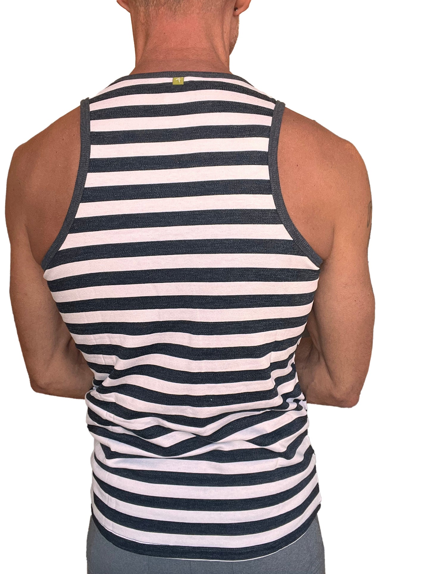 A men’s black and white striped tank top with ribbed neckline and armholes in fleece material for nautical style