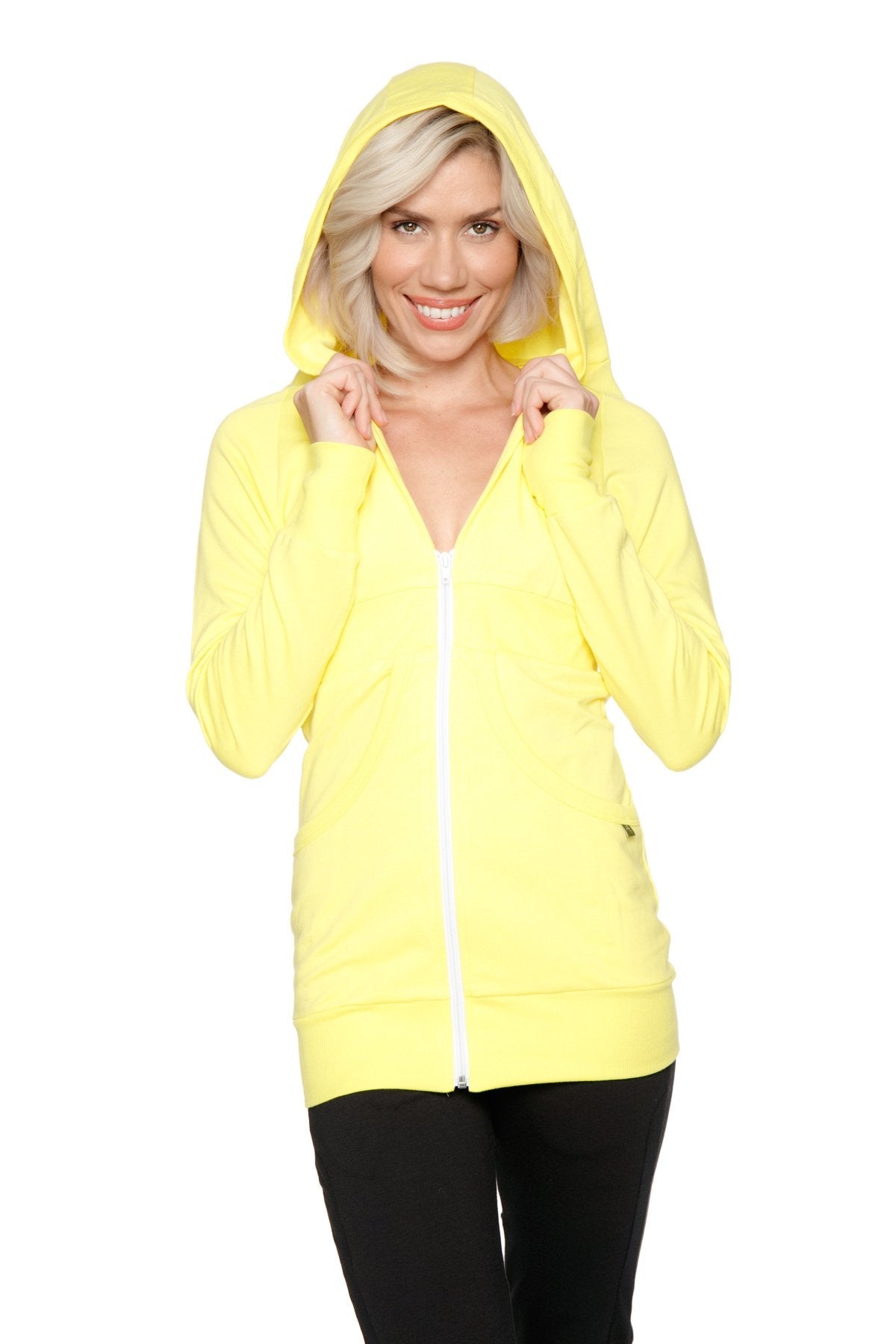 Bright yellow zip-up long body travel hoodie jacket with matching hood and white zipper for comfortable travel