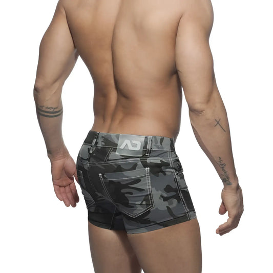 Gray camouflage patterned men’s shorts with a white logo patch on the waistband in size 32 charcoal color