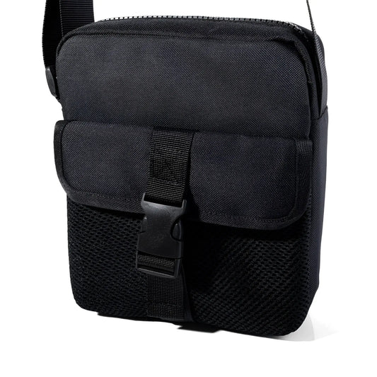 Black athletic crossbody bag featuring mesh panels and buckle closure designed for tactical and everyday use