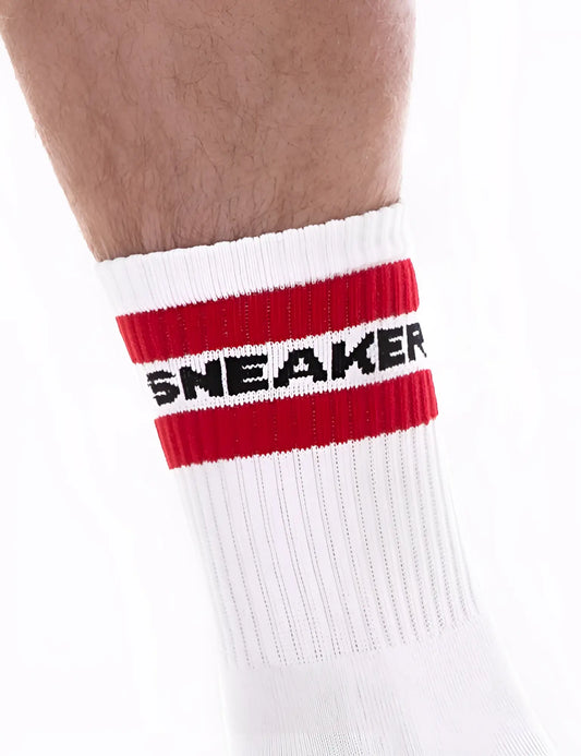 White athletic sneaker half sock with bold red stripe and black sneaker lettering on cuff by barcode berlin
