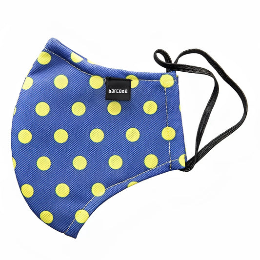 Blue fabric face mask with bright yellow polka dots and black elastic ear loops from Barcode Berlin unisex collection