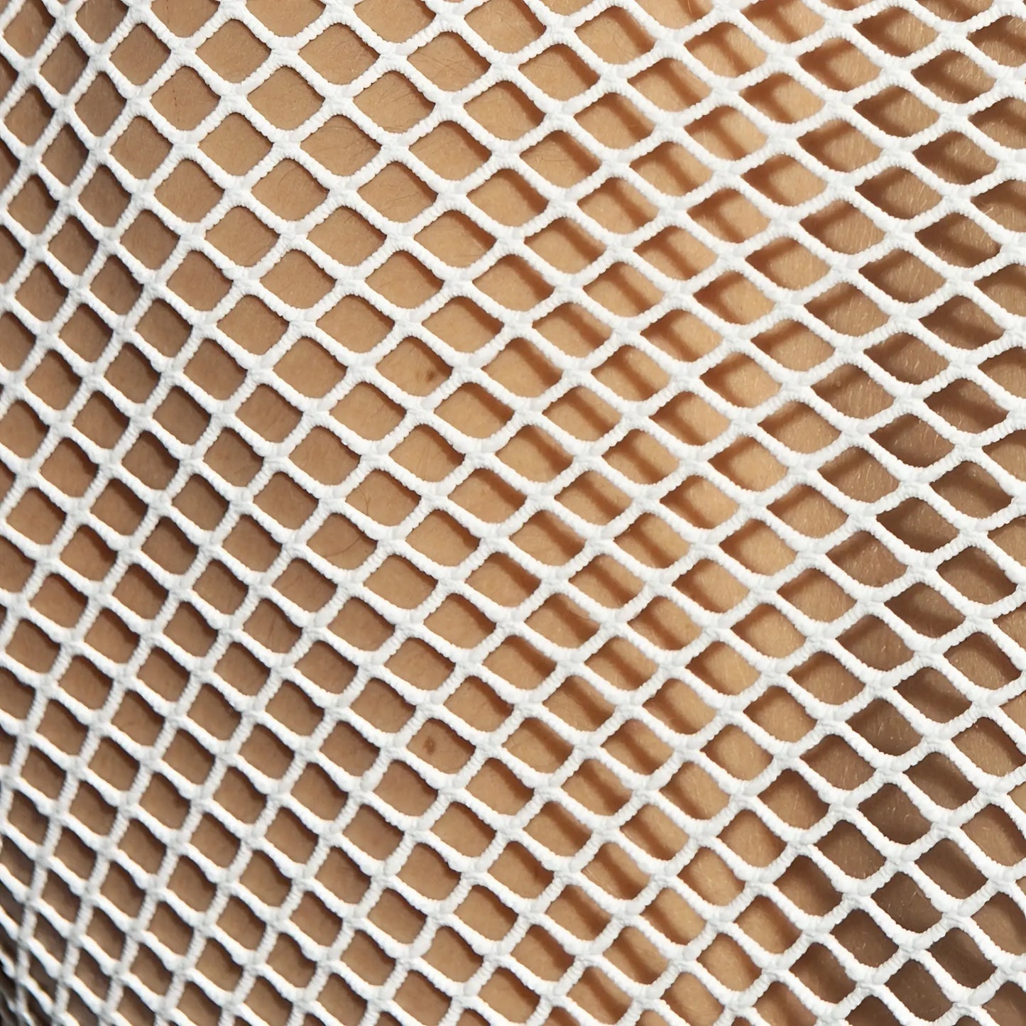 White mesh fabric with diamond pattern on the beachy net strap tank top showing breathable lightweight design
