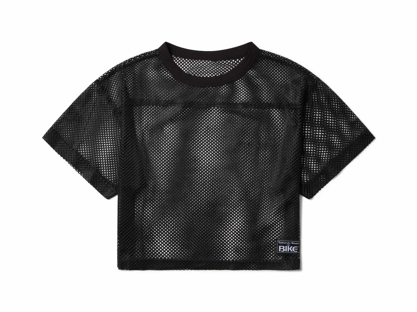 Black mesh crop top with round neckline short sleeves and small rectangular label on lower right side for bike practice jersey
