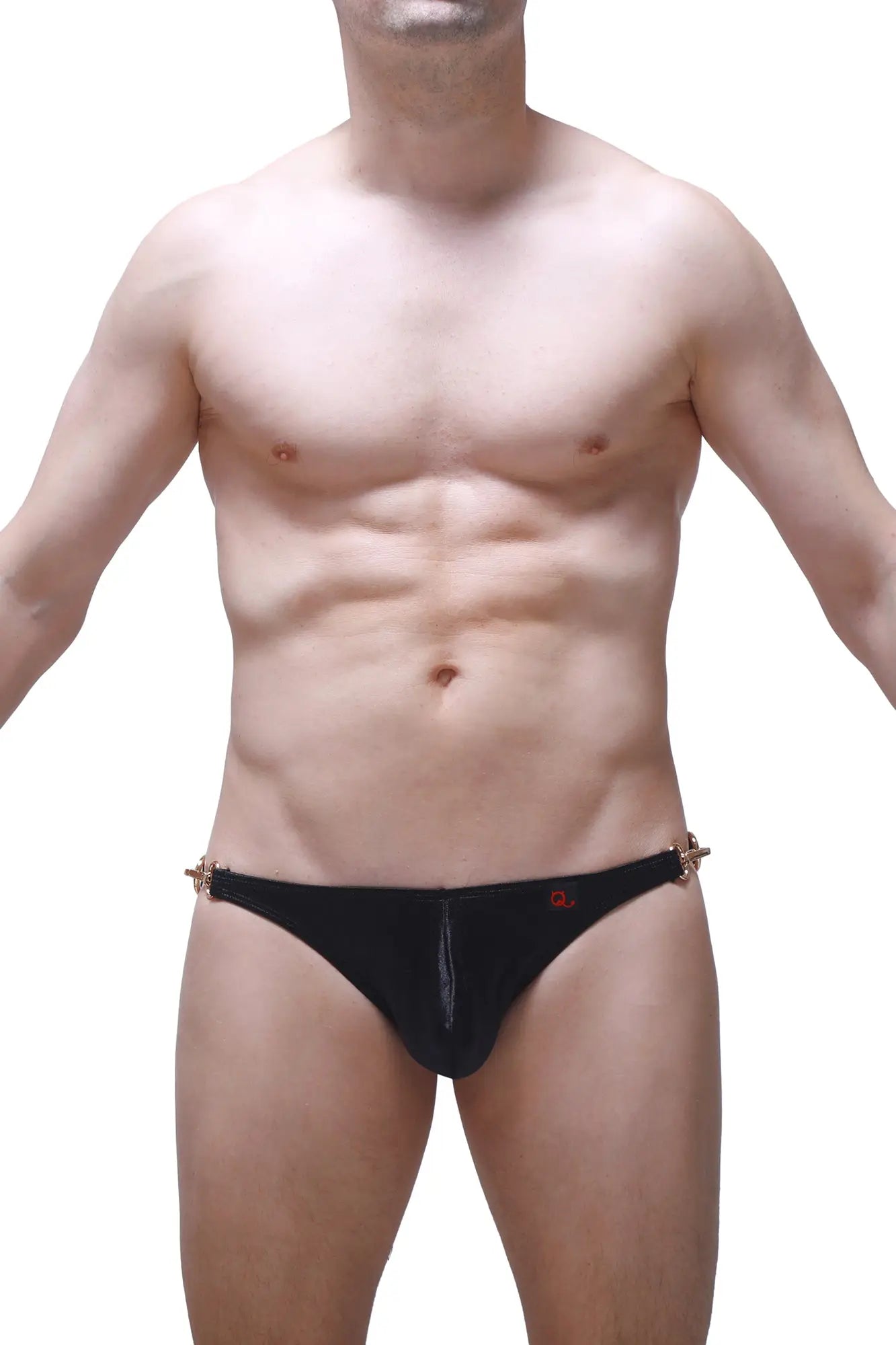 Black men’s bikini conguel satin swim trunks in black with gold tone metal side accents and a small red logo on front