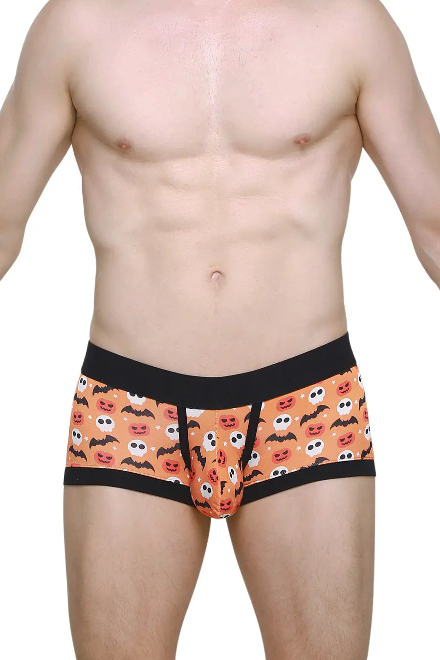 Men's orange boxer briefs with playful Halloween-themed print featuring faces and bats by PetitQ worn by a model