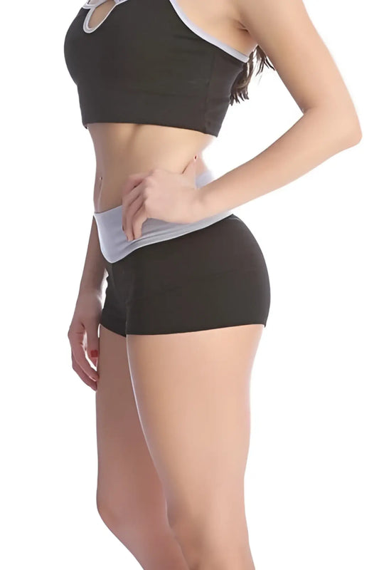 Black and gray athletic crop top with cutout neckline made from breathable fabric for activewear titled bumble short