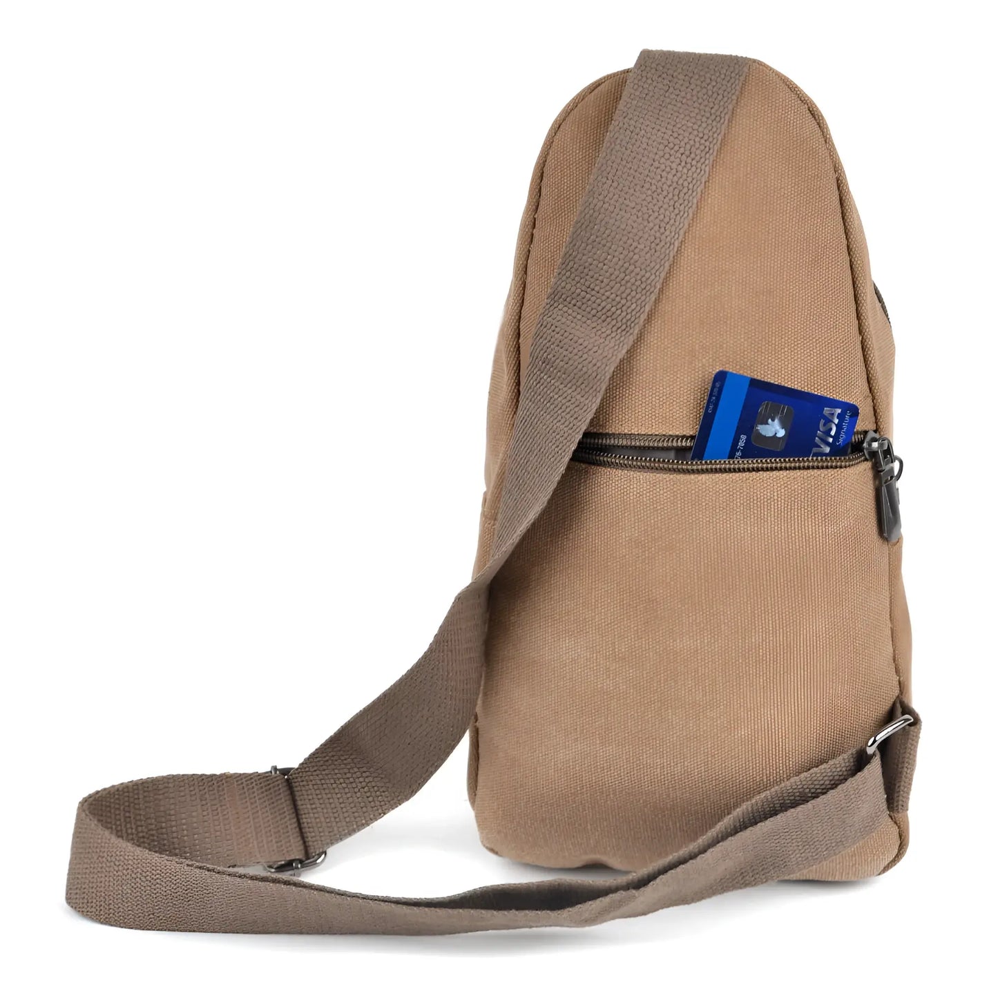 Canvas sling bag in tan with adjustable shoulder strap and front zippered pocket holding a blue visa card