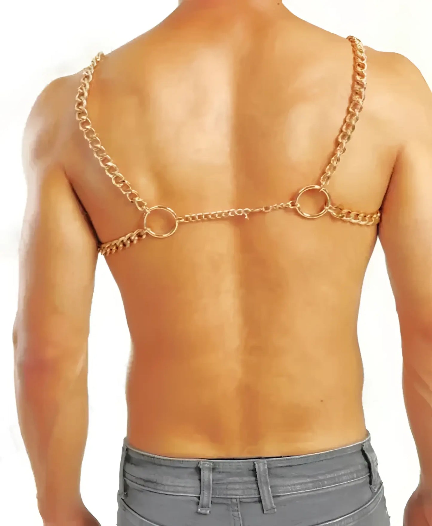 Gold-colored chain harness with two large circular rings and central link worn across the back side
