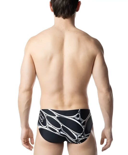 Black swim trunks with bold white abstract organic pattern from the chromium bikini collection designed for swimming