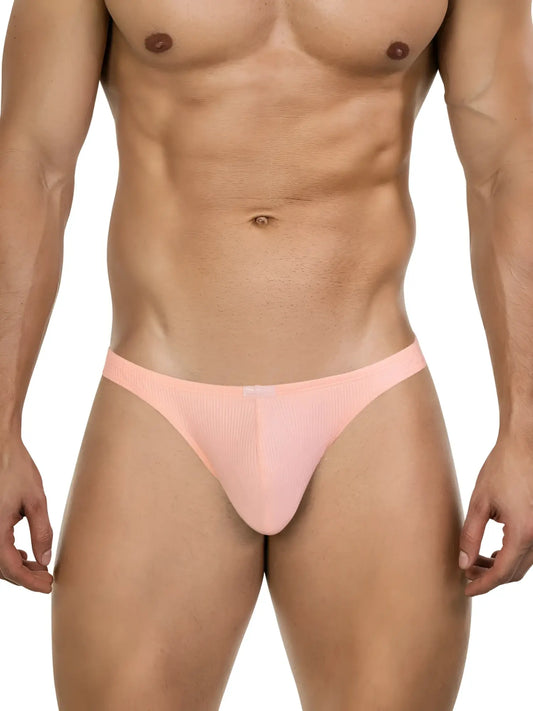 A peach-colored ribbed fabric clever 26020 apolo thong with a smooth, form-fitting design for bold comfort and style