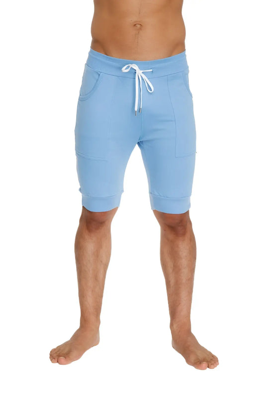 Light blue cuffed yoga shorts made of soft fabric with white drawstring and side pockets for comfortable wear