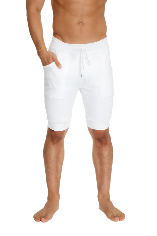 White cuffed yoga shorts with drawstring waist relaxed fit and side pockets for comfortable activewear