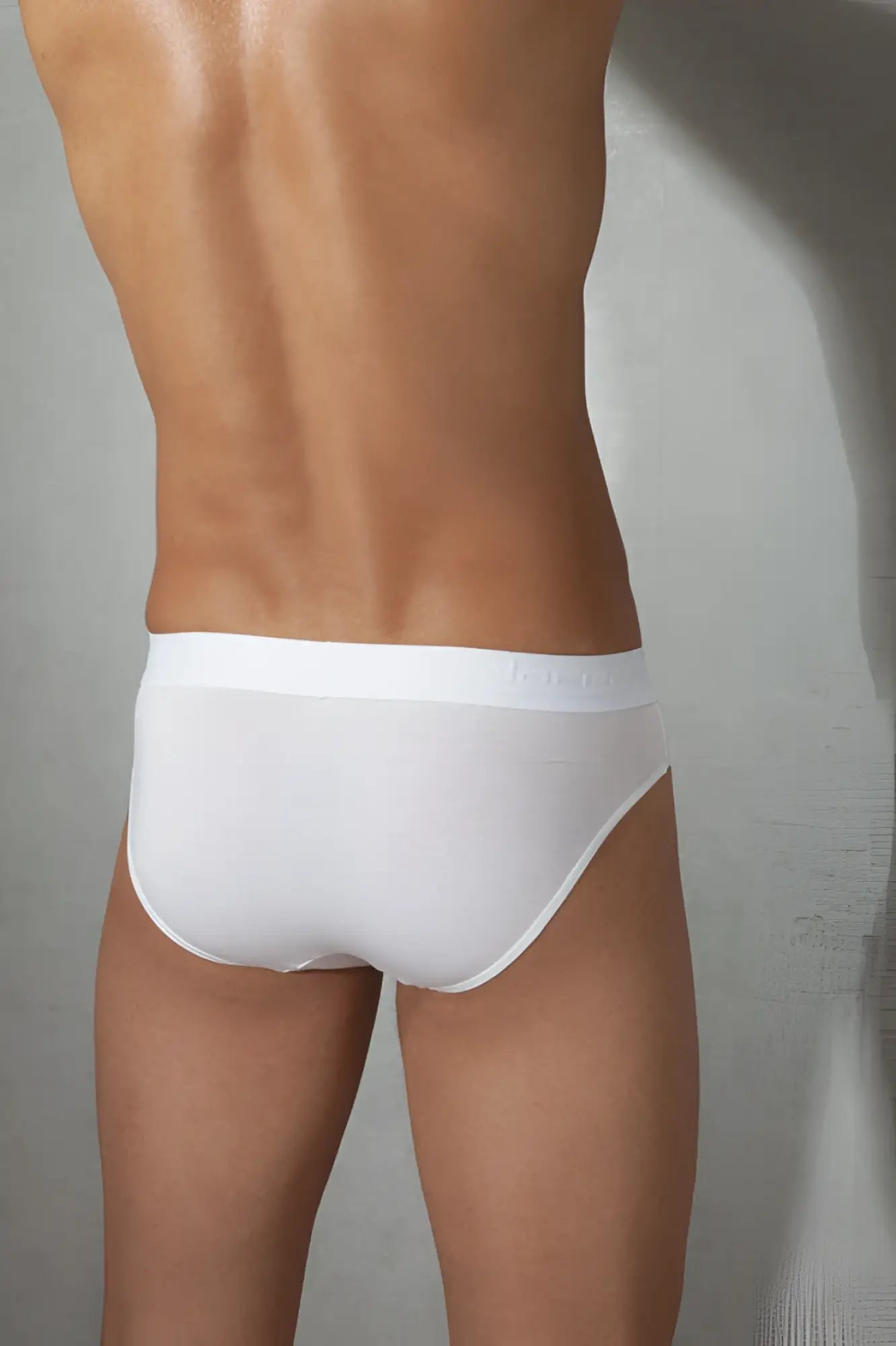 White doreanse solid brief underwear size s with smooth form-fitting design and subtle brand logo on waistband