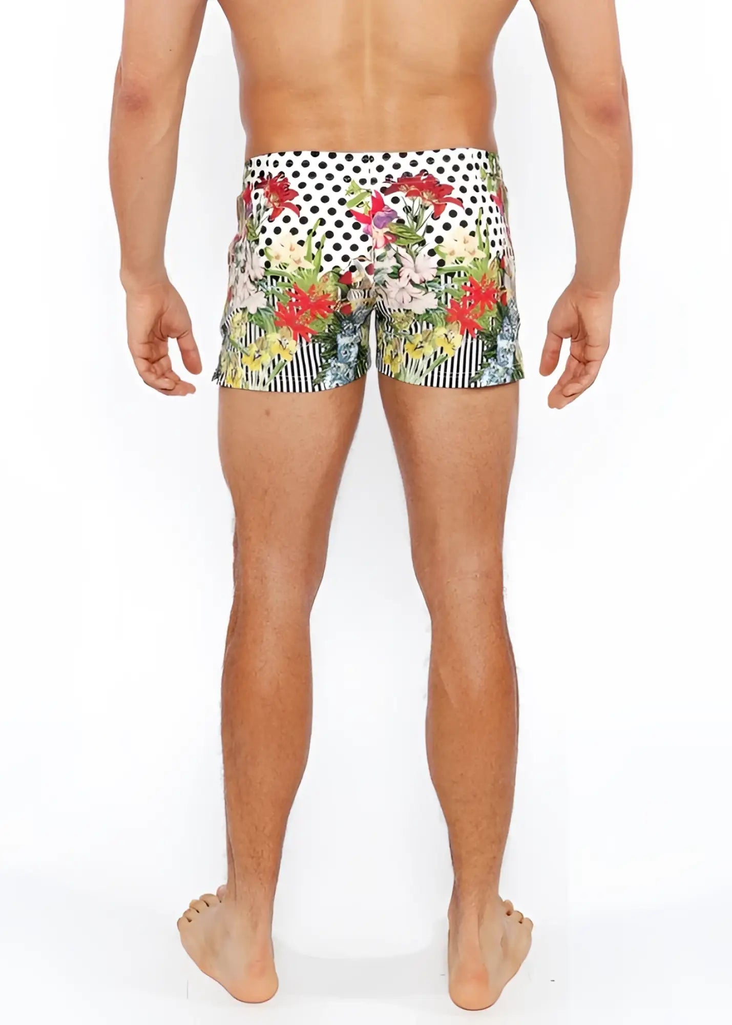 Dots abstract printed swim short featuring vibrant floral and polka-dot patterns with red pink green and yellow blossoms