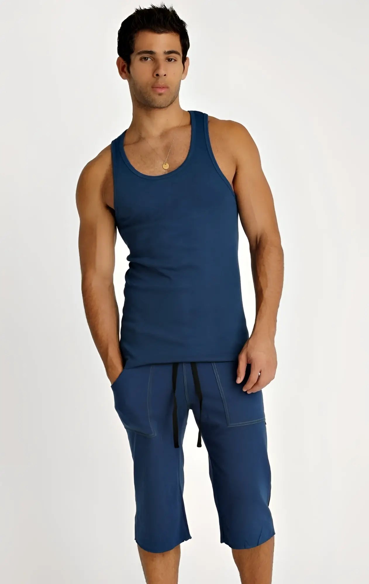 Men’s eco-track short set in royal blue with black features a sleeveless tank top and matching capri-length shorts