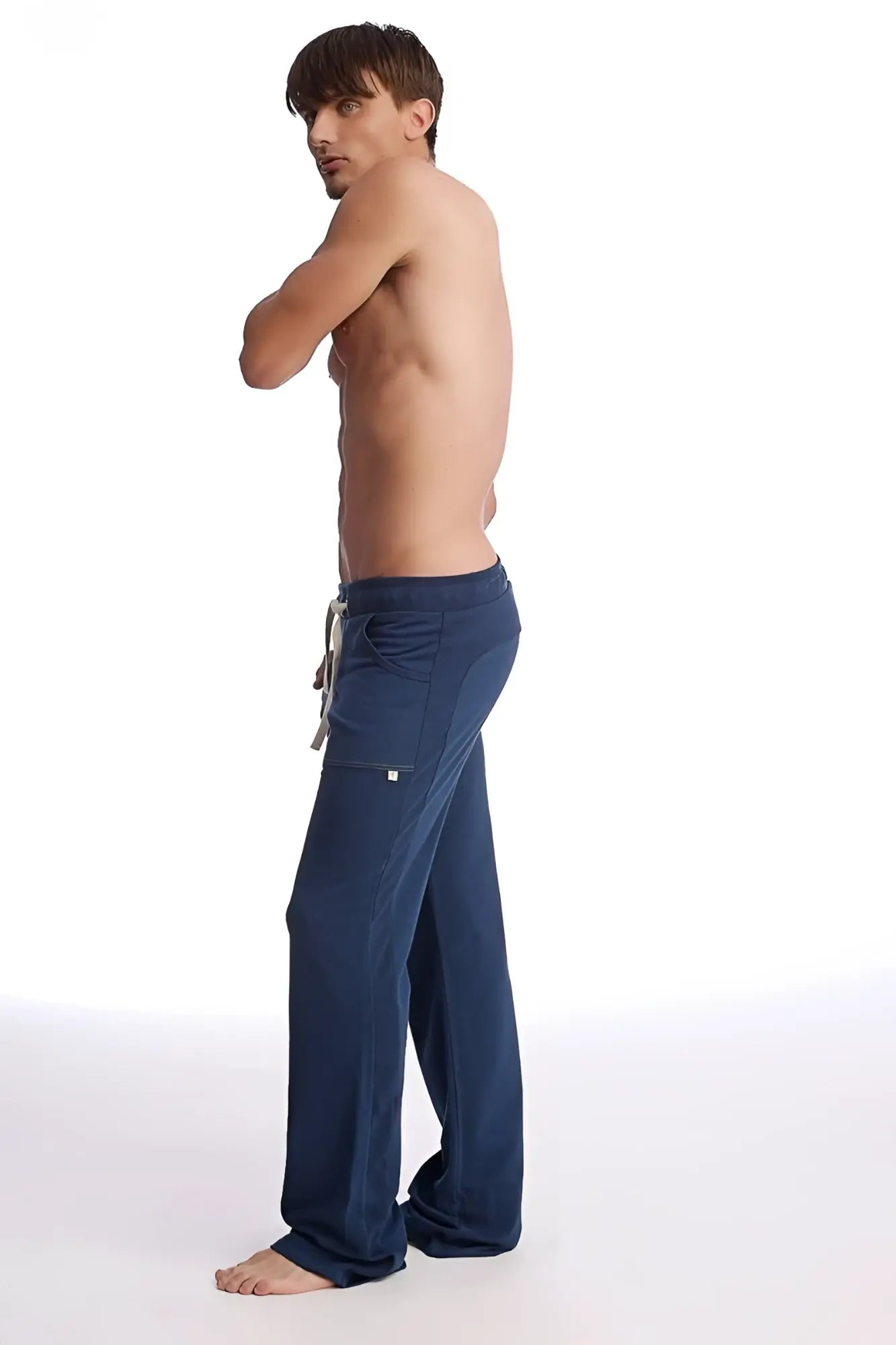 Navy blue eco-track and yoga sweat pant with loose fit drawstring waist and side pockets for comfortable wear