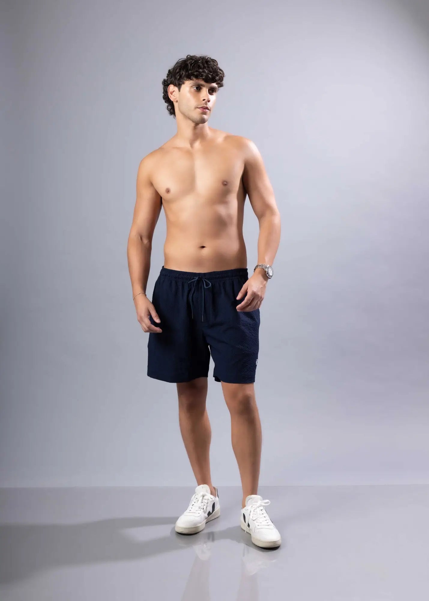 Navy blue essential swim short with drawstring closure made for comfortable swimming and beachwear available in 3 colors