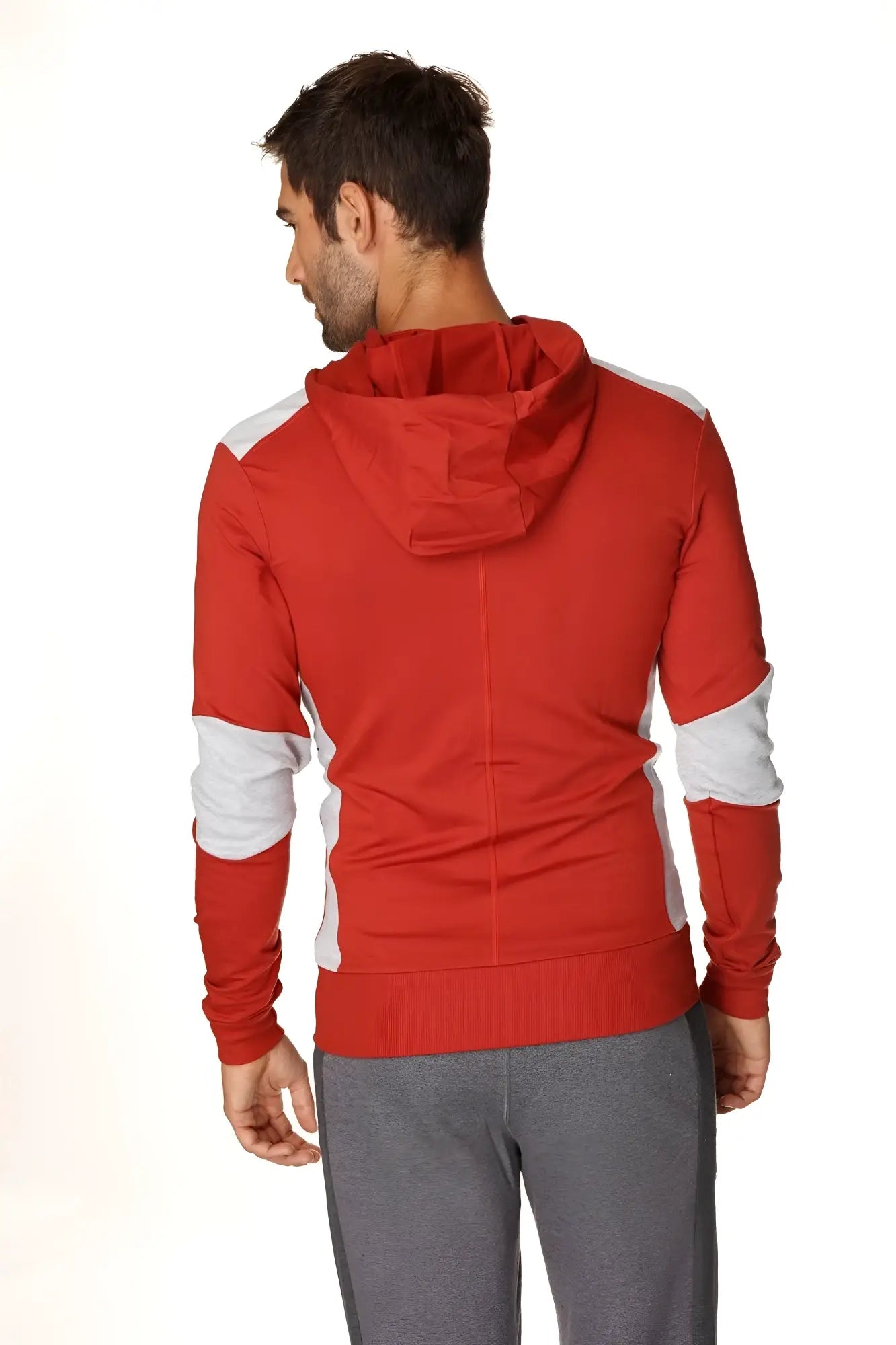 Form-fit crossover yoga track performance hoodie in cinnabar grey with red and white panels on shoulders sleeves and sides