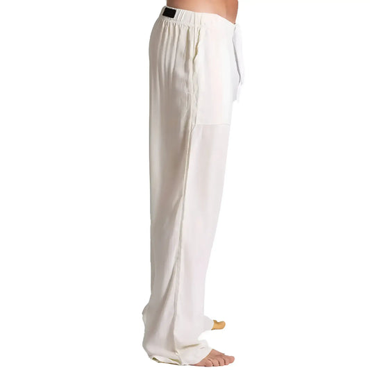 White loose-fitting Gigo Chalis beige pants with drawstring waist and subtle side seam detailing