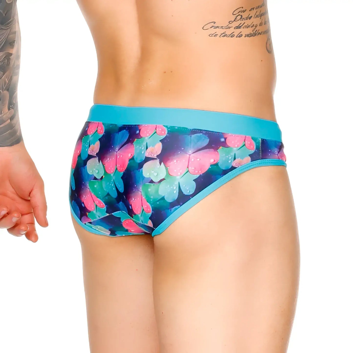Vibrant blue and pink butterfly patterned gigo flowers swim brief with solid teal waistband for swimming and beachwear